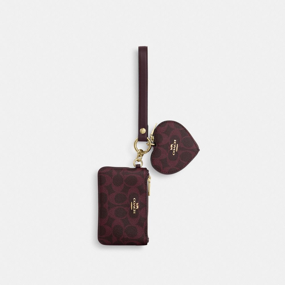 Wristlet And Heart Pouch With Charm