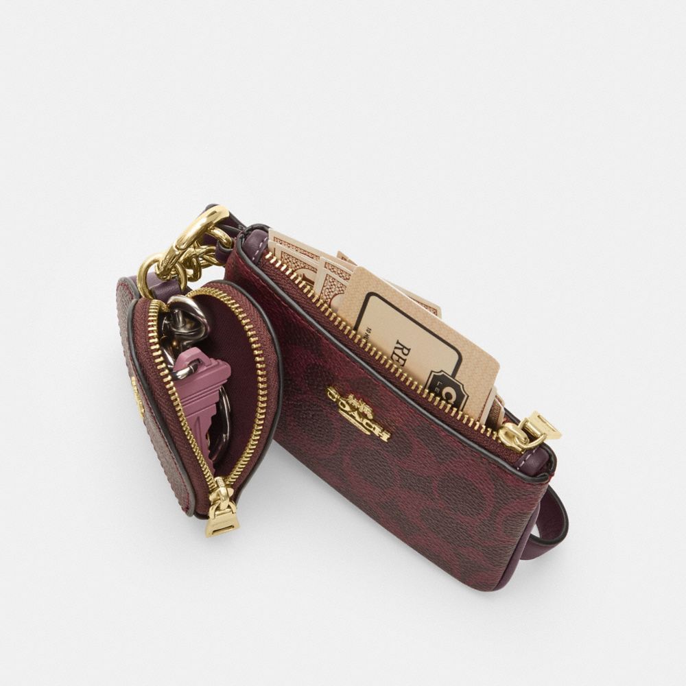 Wristlet And Heart Pouch In Signature Canvas