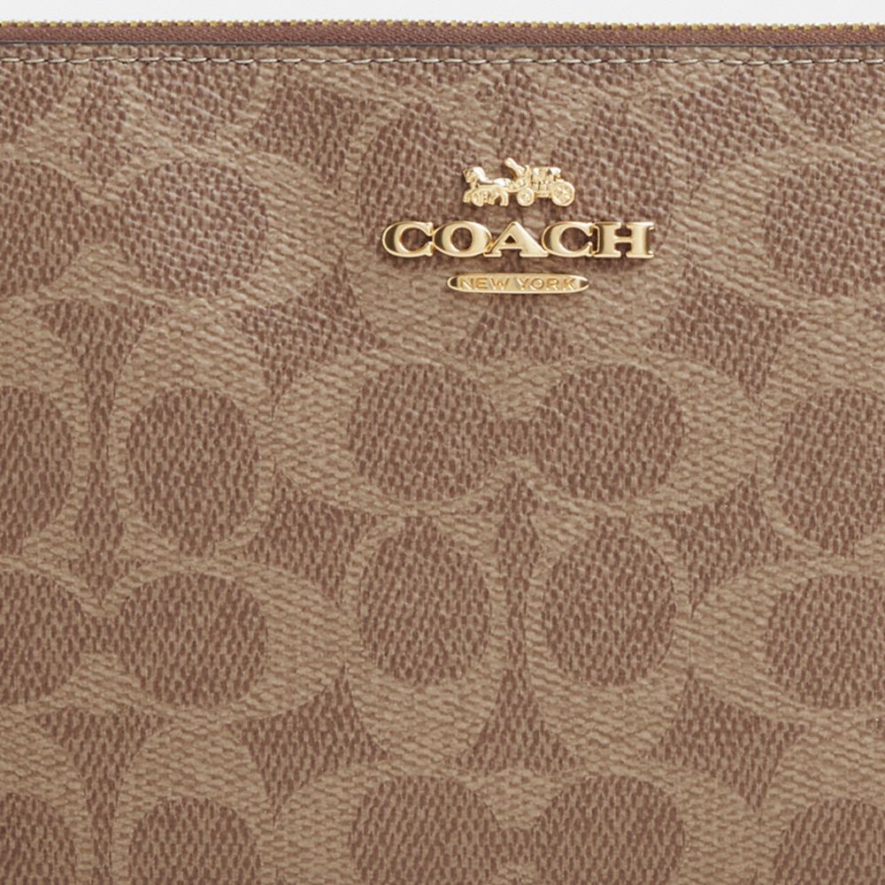 Large Corner Zip Wristlet In Signature Canvas